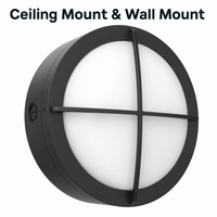 LED Round Bulk Head Light With Cross Trim - Wall or Ceiling Mount – Wet Location - Watt Selectable 60W/48W/36W - Color Selectable 30K/40K/50K - 120/277V - Black Finish - Integrated Photocell Included