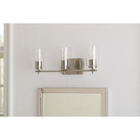 Adley Collection Three-Light Brushed Nickel Clear Glass New Traditional Bath Vanity Light - Damp Location Listed