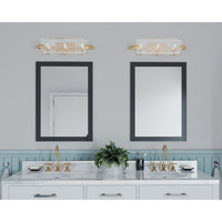 Cahill Collection Three-Light Brushed Bronze Clear Glass Luxe Bath Vanity Light - Damp Location Listed