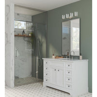 Riley Collection Four-Light Brushed Nickel Clear Glass Modern Bath Vanity Light - Damp Location Listed