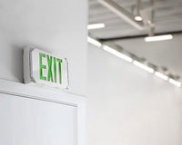Hazardous Location LED Exit Sign & Emergency Light - Single Face - Gray Housing Color with Green Lettering - 120-277V - with 90 Minute Battery Back-Up
