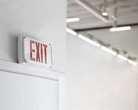 Hazardous Location LED Exit Sign & Emergency Light - Single Face - Gray Housing Color with Red Lettering - 120-277V - with 90 Minute Battery Back-Up